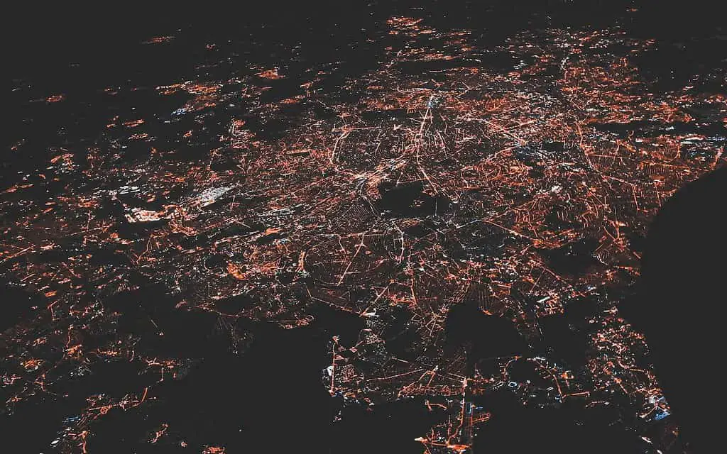 lighted city at night aerial photo